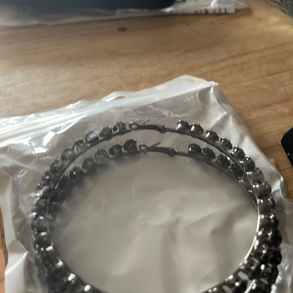 Large hoop earrings with fake black gems